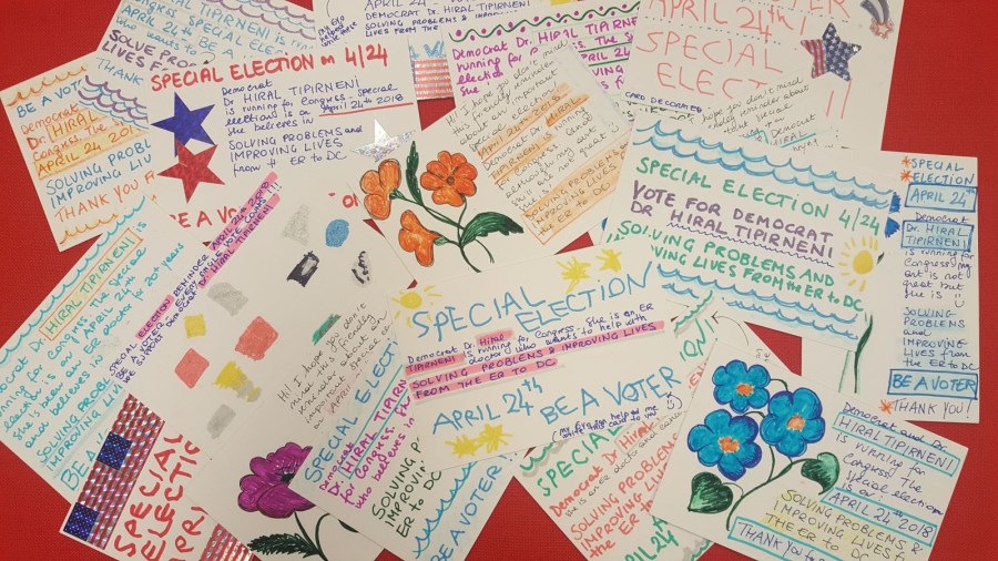 display of hand-written postcards promoting Dr. Hiral Tipirneni