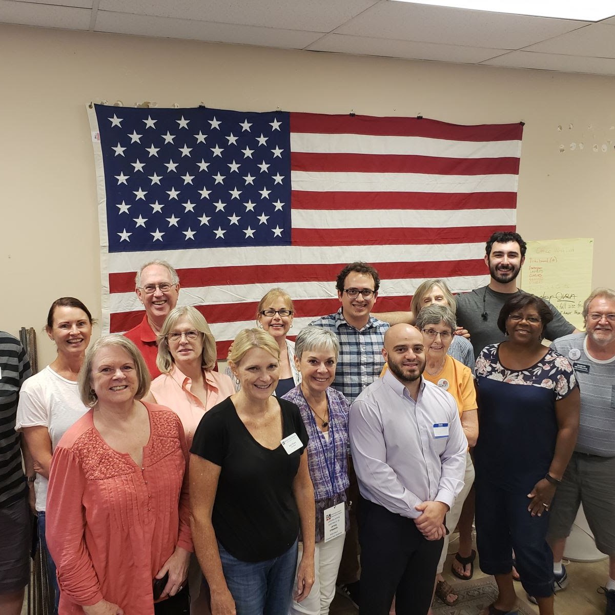 group photo of volunteers and staff at Tipirneni campaign office